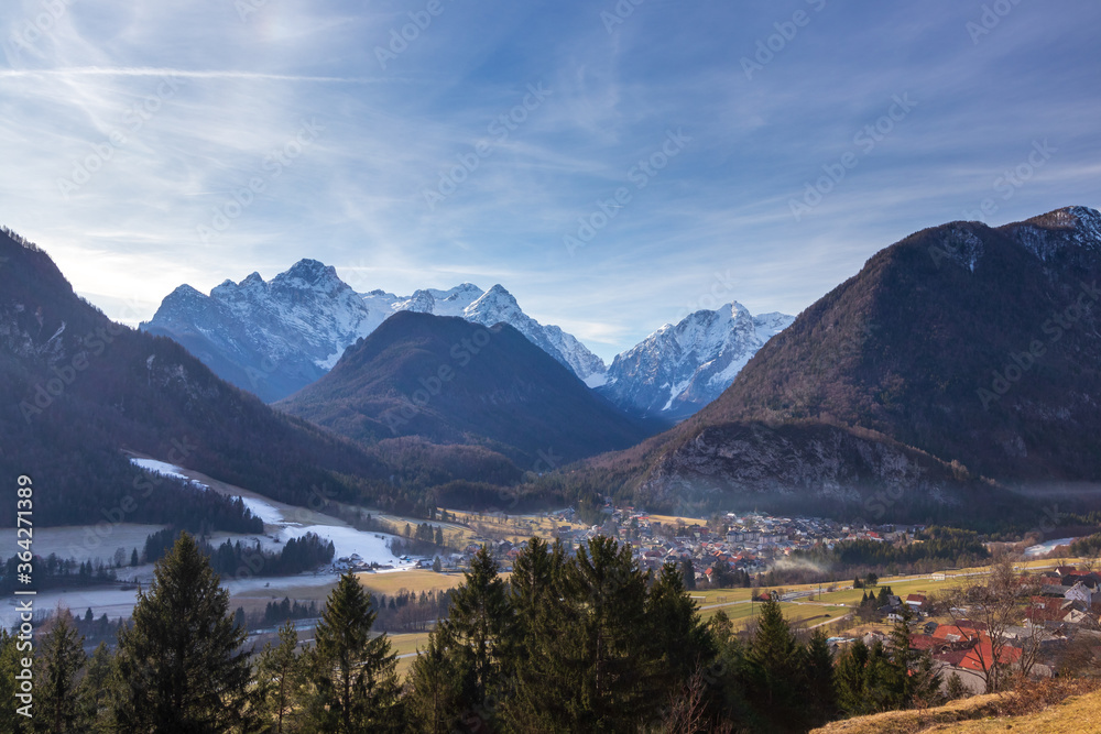 Village Mojstrana Slovenia mountains alps snow spring fog valley