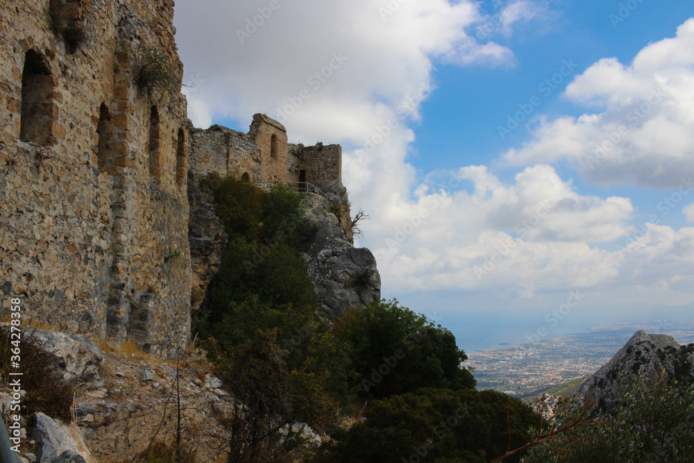 Stone walls of the castle of Saint Hilarion. Below you can see Kyrenia and the Mediterranean sea. Cyprus.
