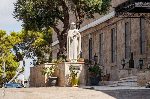 The large stone statue of the Virgin Mary in the courtyard of the Stella Maris Monastery which is located on Mount Carmel in Haifa city in northern Israel