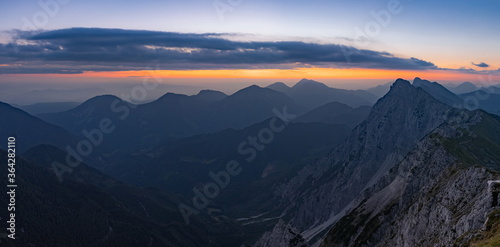 Panoramic morning view of the Kosuta ridge in Karavanke range alps before the sunrise, Slovenia