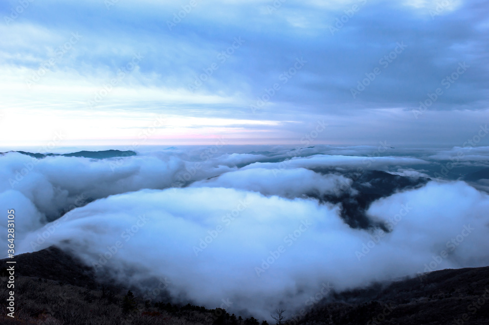 Beautiful sea of clouds at dawn on the top of the mountain.