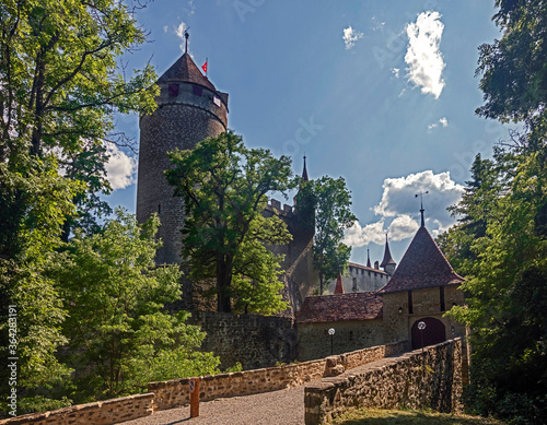 Castle in the village of Lucens Chateu de Lucens, Switzerland. XVI century photo