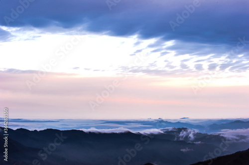 Beautiful sea of clouds at dawn on the top of the mountain. © Chongbum Thomas Park