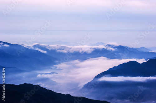 Beautiful sea of clouds at dawn on the top of the mountain. © Chongbum Thomas Park