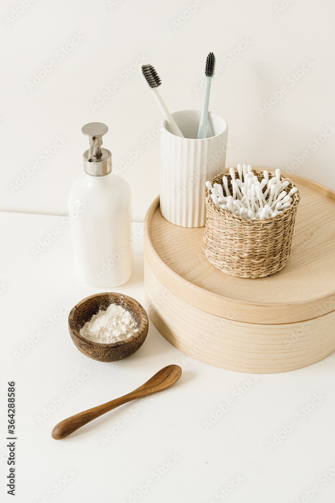 Beauty, health care morning routine products. Spa, wellness, treatment essentials. Toothbrushes, ear sticks, liquid soap cream on white table Beauty, health care morning routine products. Spa, wellness, treatment essentials. Toothbrushes, ear sticks, liquid soap cream on white table