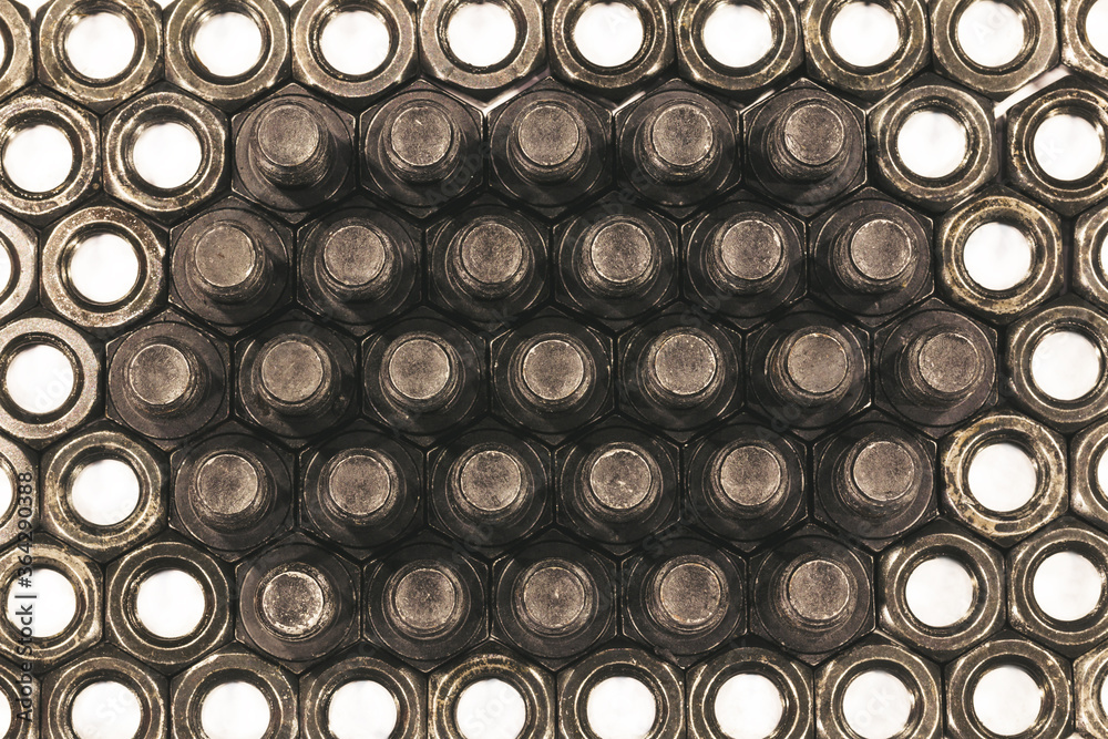 Pattern of bolt and nut arrange on white background as abstract Pattern of bolt and nut arrange on white background as abstract