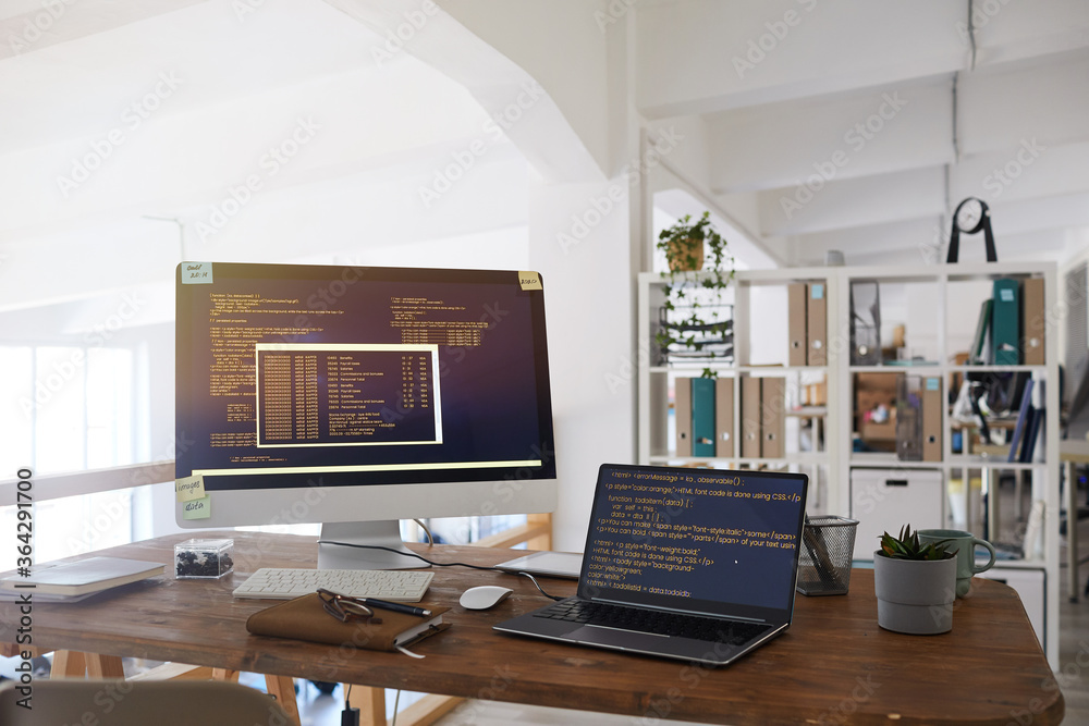 Background image of black and orange programming code on computer ...