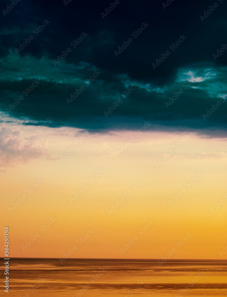 Dramatic Sunset sea horizon sky clouds sunset landscape. Nature sundown wallpaper