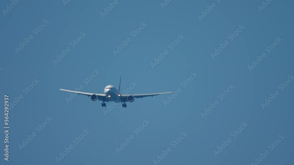 Widebody airplane approaching before landing Widebody airplane approaching before landing