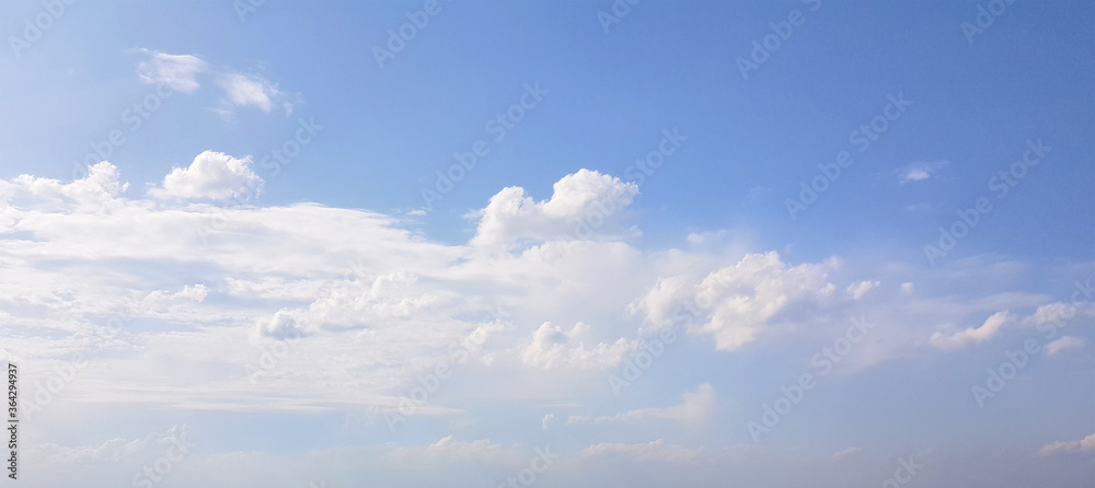 Blue sky clouds background. Beautiful landscape with clouds and day sky - obrazy, fototapety, plakaty 