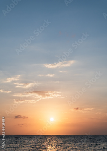 sunset over the sea vertical 