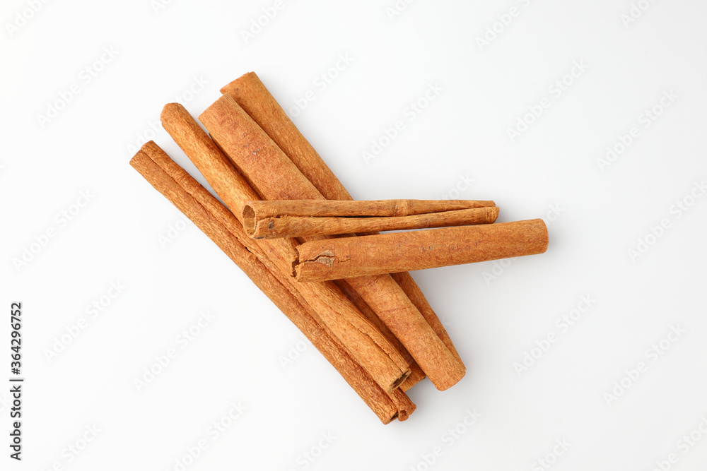 Top view flat lay a cinnamon stick is herb seasoning aromatic isolated.