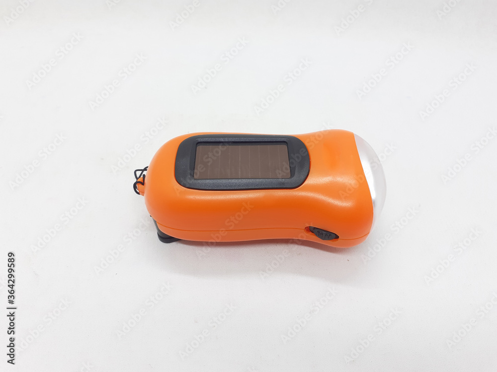 Pocket Light Electronic LED Emergency Flashlight in White isolated background Pocket Light Electronic LED Emergency Flashlight in White isolated background