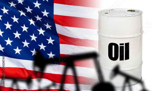 Oil in the United States. Concepc - US oil industry. Oil production in America. Shale. Hydrocarbon market. White barrel on the background of the USA flag. Inscription petrolium on a white barrel photo