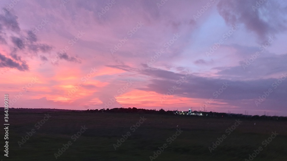 Fototapeta premium sunset over the field