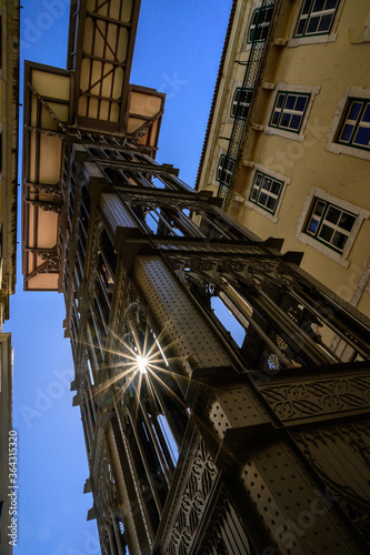 Old town elevator metallic structure with sunstar