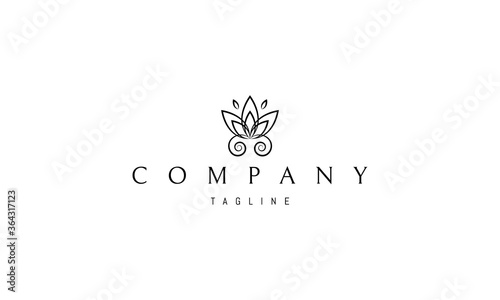 Vector logo on which an abstract image of a butterfly with wings similar to the petals of a lotus flower.
