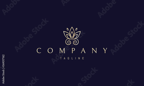 Vector golden logo on which an abstract image of a butterfly with wings similar to the petals of a lotus flower.