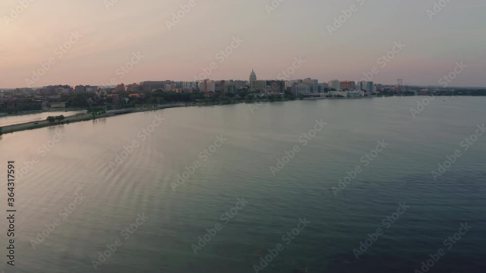 Flying above the Lake Monona and road leading to the city of Madison Flying above the Lake Monona and road leading to the city of Madison