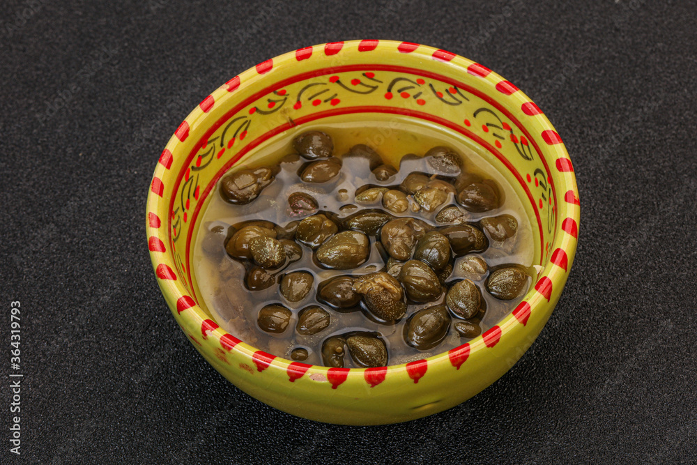 Tasty capers in the bowl Tasty capers in the bowl