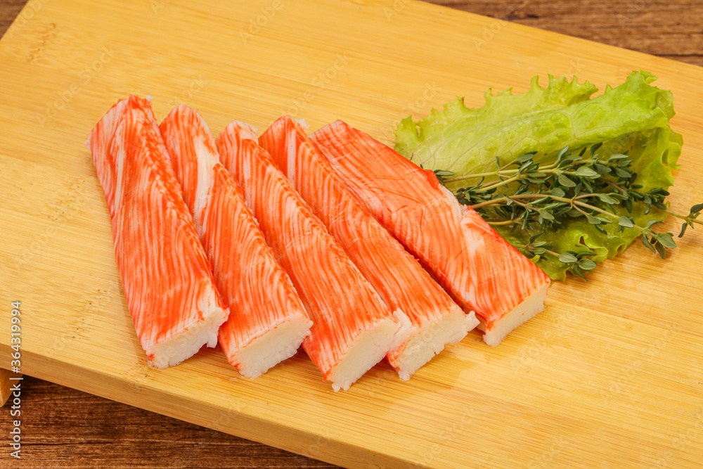 Crab sticks served salad leaves Crab sticks served salad leaves