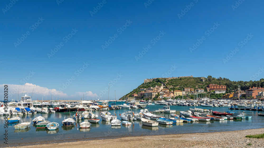 Panorama of Porto Ercole on a sunny day, Argentario, Italy