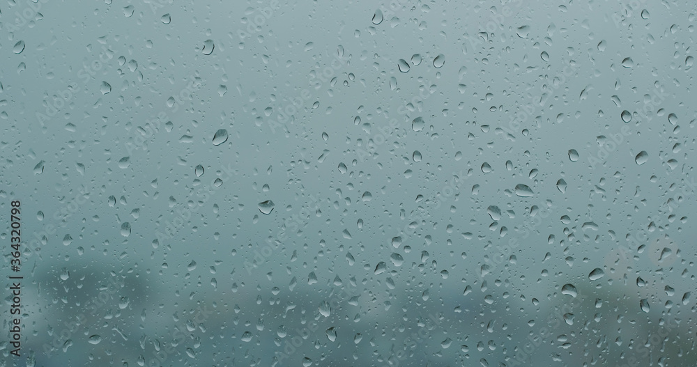 Heavy raining outside, rain on the window glass Heavy raining outside, rain on the window glass