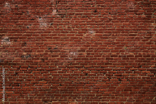 Vintage brick wall, great design for any purposes. Background texture old. Grunge urban backdrop. Cracked surface grunge texture. Red brick wall. Dirty old surface.