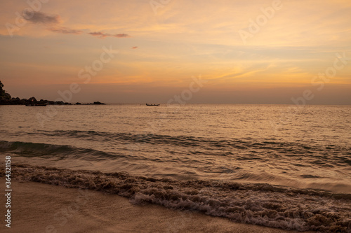 Landscape of sunset tropical beach in Phuket, Thailand