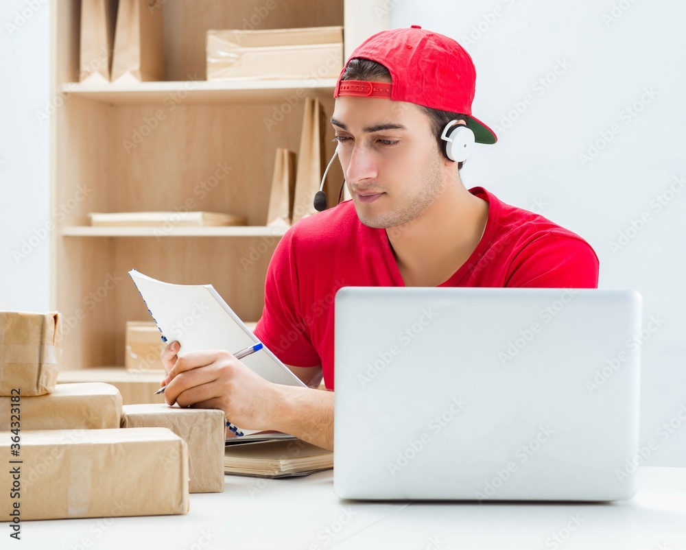 Call center worker at parcel distribution center in post office Call center worker at parcel distribution center in post office