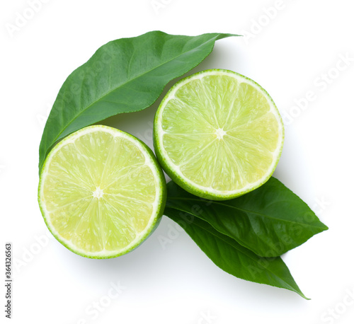 Sliced Limes With Green Leaves Isolated