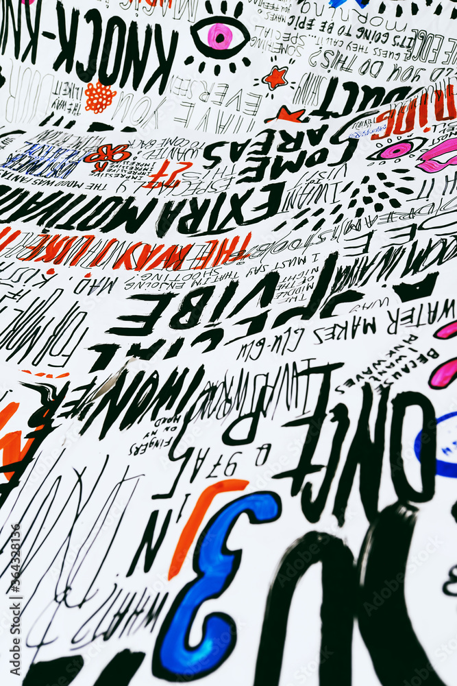 Fototapeta premium Casual graffiti design with abstract tags, letters, numbers without meaning