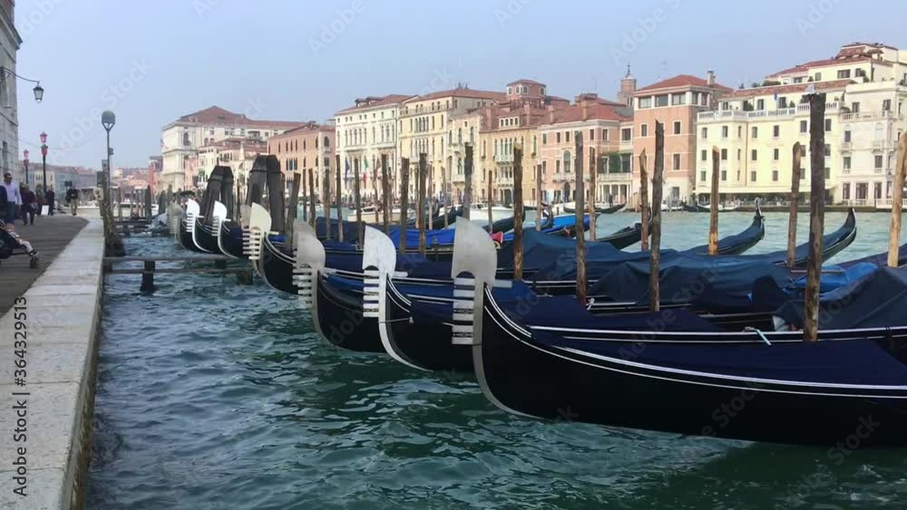 Boats align parking at the dock in Venice, Italy. Boats align parking at the dock in Venice, Italy.
