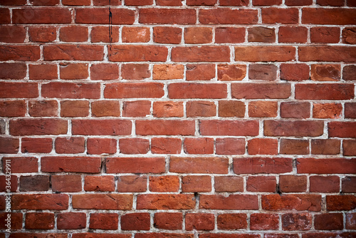 Red brick wall background. Old brick texture, close up