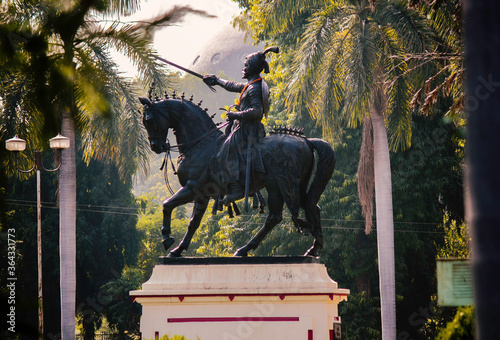 A statue monument of Shivaji on a horse in Gujrat state in India photo