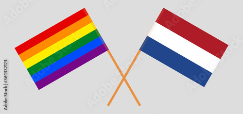 Crossed flags of LGBT and the Netherlands
