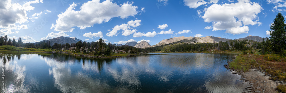 An HDR panorama of Skull Lake in Wyoming's Wind River Range. In the distance, from left to right, Mt. Geikie, MT. Hooker, Pyramid Peak and Dike Mountain are visible.