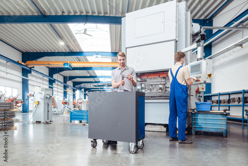 Manufacturing workers on the factory floor being industrious