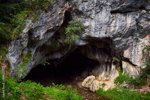 Bolii cave huge entrance near Petrosani city, Romania