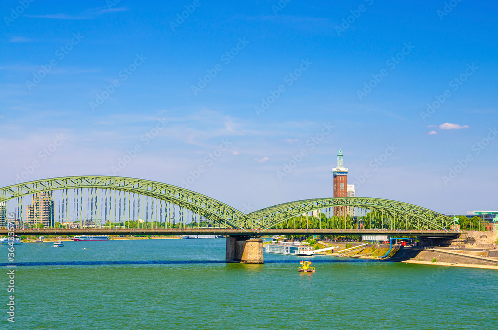 Naklejka premium The Hohenzollern Bridge or Hohenzollernbrucke across Rhine river