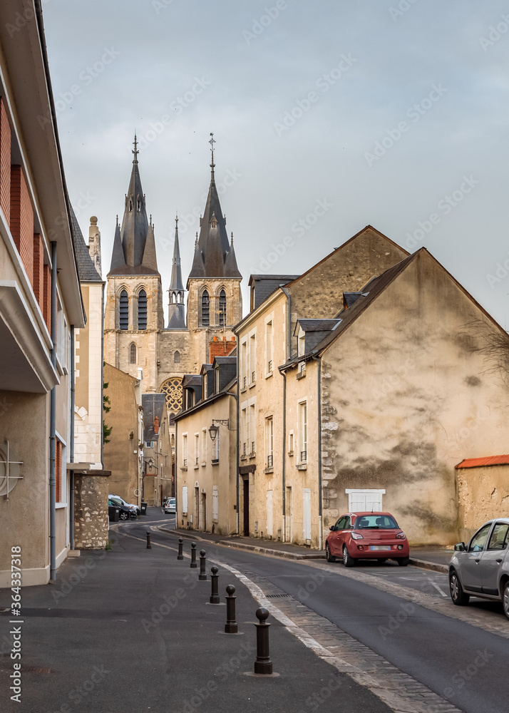Blois, Loire Valley, France. Empty narrow street leading to the church in the old town.