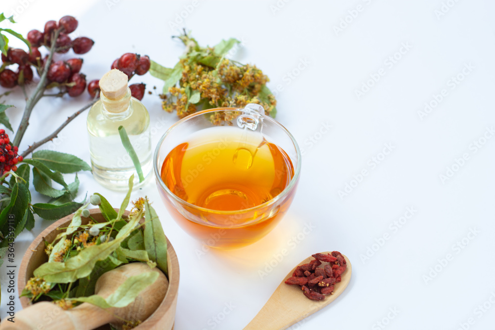 herbal Cup of healthy tea from linden flowers. alternative, complementary traditional medicine concept improve the functioning of the stomach herbal Cup of healthy tea from linden flowers. alternative, complementary traditional medicine concept improve the functioning of the stomach