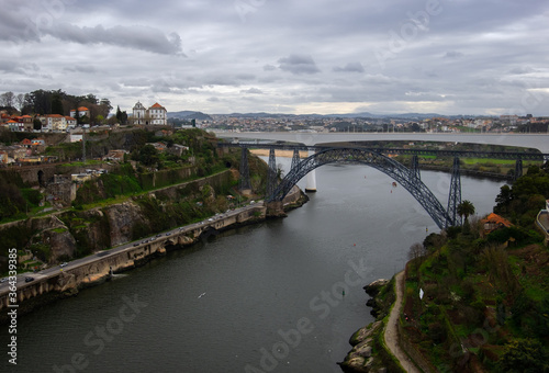 View of the Douro River and the Ponte de D. Maria Pia and Ponte de São João Railway Bridge.