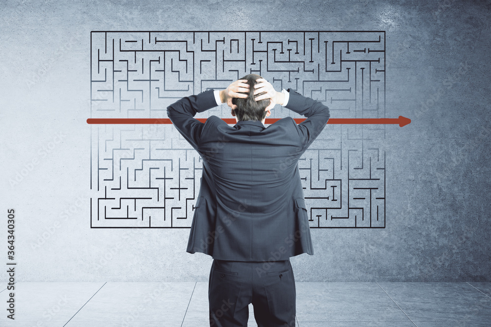 Scared businessman looking on creative labyrinth sketch Scared businessman looking on creative labyrinth sketch