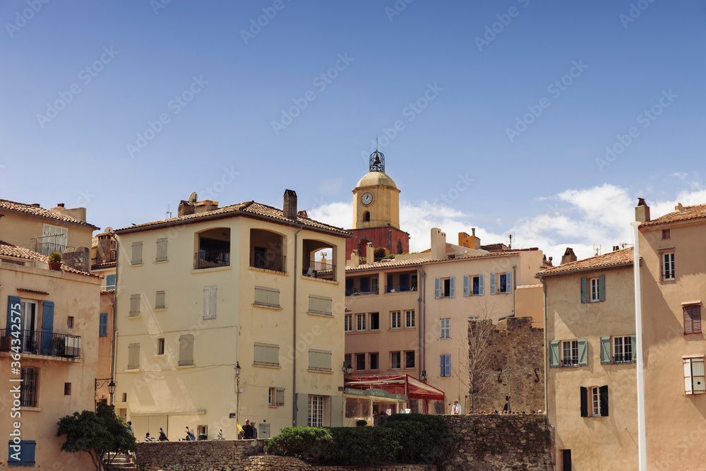 Old bell tower and residential buildings in Saint-Tropez