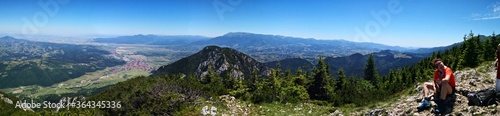 Mountain landscape in the summer with blue sky - panormic view  - hiker resting