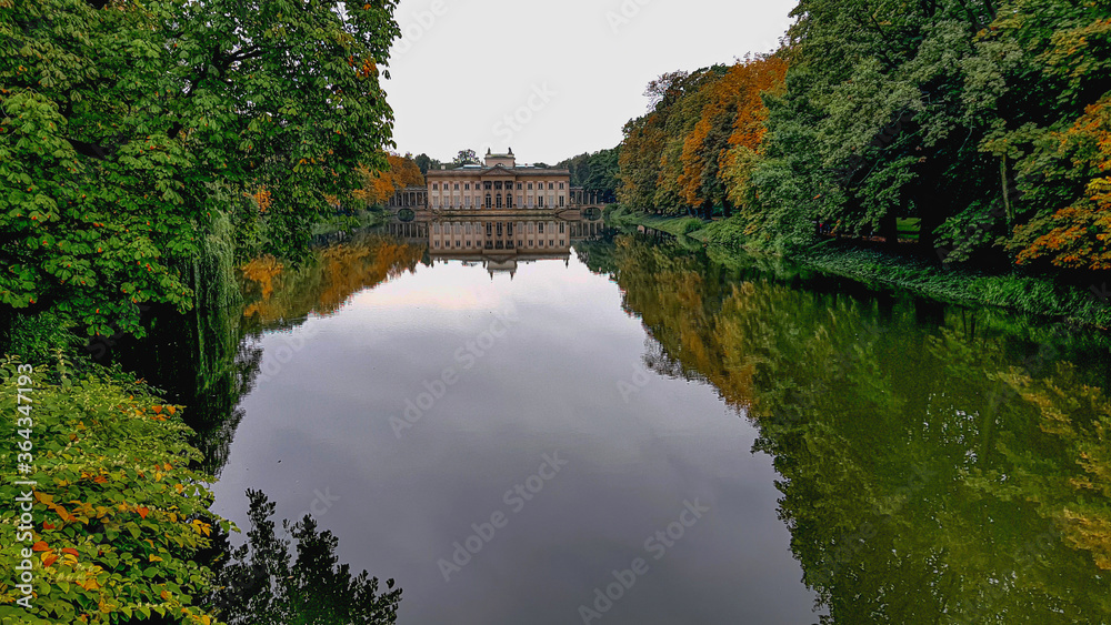 Symmetrical reflection of the palace on the water in Lazienki, warsaw, Poland.