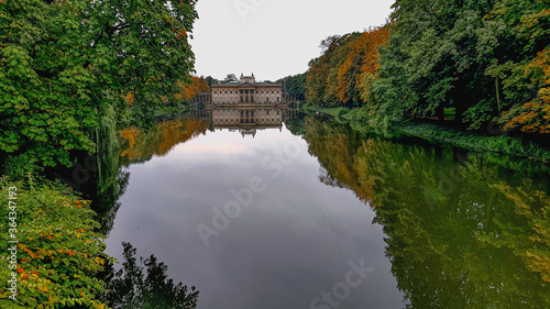 Symmetrical reflection of the palace on the water in Lazienki, warsaw, Poland.