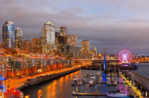 Seattle Skyline Showing the waterfront of Seattle After Sunset. The Central Waterfront of Seattle, is the most urbanized portion of  Elliott Bay shore.