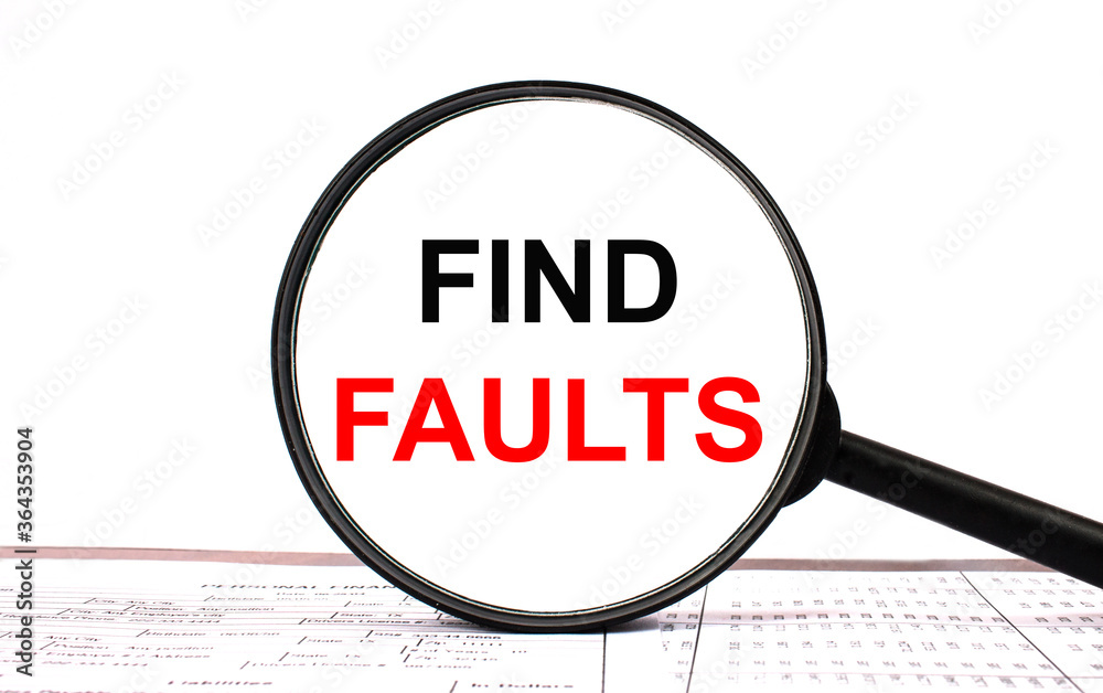 Magnifying glass with text Find Faults on financial tables Magnifying glass with text Find Faults on financial tables